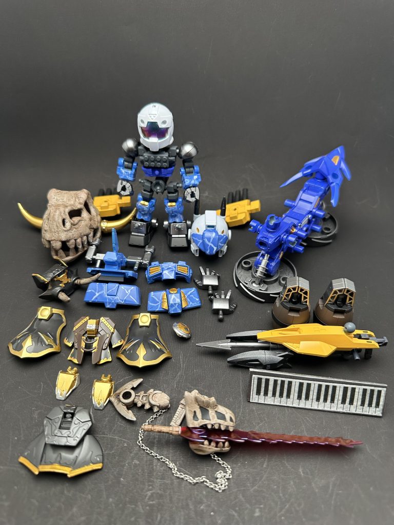 塗装レシピGアームズEDO時塗装色金 スターブライトゴールド黄 マンダリンイエロー銀 フレームメタリック1黒 グラファイトブラックメイン装甲コバルトブルーの上に、シャバ目のクリアブルーとシャバ目のGXホワイトにクリアブルー少量入れたもので、水中迷彩っぽくしてみました海賊時塗装色金 スターブライトゴールド黒 グラファイトブラック茶 ウッドブラウン骨部は、ウッドブラウンの上にGXホワイトとタンで調色した色を塗って、Mr.ウェザリングカラーのグランドブラウンで汚しを入れ、古代の骨感を出しました