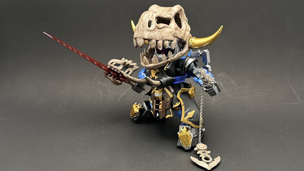 もう一つの姿ホネホネ海賊団🏴☠️ザ・ボーンハンターホネホネロックを演奏、唄いながら様々な海域を彷徨う、ジム顔の女海賊正確に言うと、彼女は海賊では無く、海賊に扮して、海での情報収集や治安の維持に務めているのだ深海に眠る古代生物のホネを発掘し、自らの武具に加工している