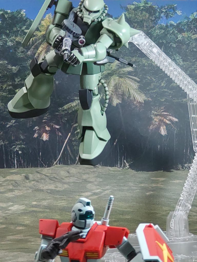 いっきに加速して飛び出すジム・ライトライナーそして、眼前にはザクと戦うスワ少尉のジムがいたしかし、そのスワ少尉を上空より降りてきたザクが強襲する