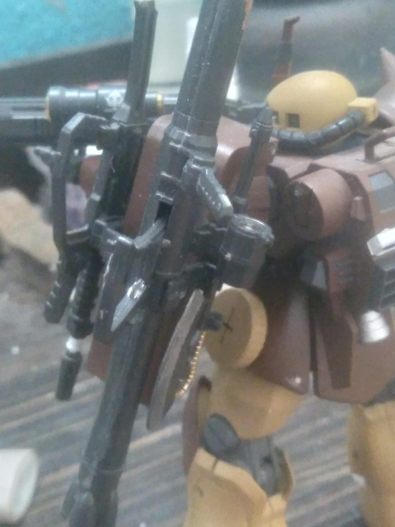 Shield mounted weapons rack