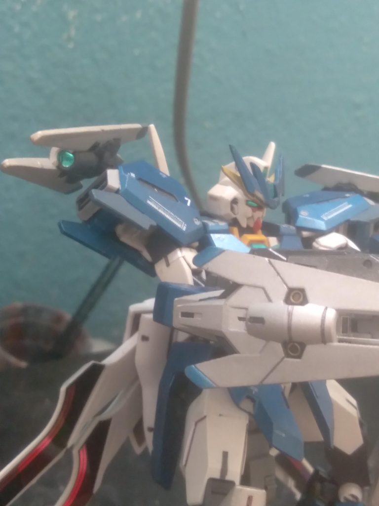 For close combat, it has 2 beam saber handles stored on the backpack. These are energy swords that are capable of slicing through the enemy's toughest armor