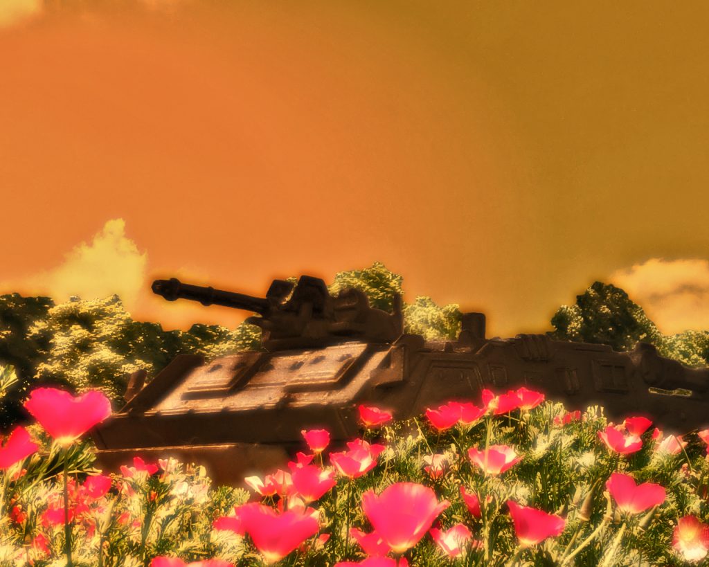 「コロニーが落ちてから異常気象で地球は大きく変わった。かつての農耕地帯では作物が育たなくなり、お前さんが見た植物も例外じゃない」「ここはコロニー落下の影響がなかったんですか?」「この土地はたまたま被害がなく医療用植物を育てるのに適した場所だったのを連邦軍が見つけたんじゃよ。本来は医薬品植物の栽培は政府の専門機関の管轄じゃが連邦軍が独自で栽培を始めた」「無認可という事ですか?」「建前上は戦時下における特例で押し切るつもりじゃがな。だがどこも人手不足でな。育てるのに現地の人間にも協力してもらっている」「現地の人って医療用植物の栽培経験なんてないですよね?」「手引書は渡しておる。この村とて目ぼしい産業がある訳でなく限界集落になりつつある。連邦軍も村も互いに生き延びる為には必要なんじゃよ」「戦争が村を生かしてると言うんですか?」「皮肉なもんじゃよ。命を奪う戦争がこうやって仕事を産んで人の命を救う薬を作り、村の人々の人生を守っておる」「だからって私はこの戦争に正当性はないと思います」「それもまた正しいものの見方じゃ。世の中みんな自分が正しいと思って行動しておる。正義や正しさなんてのは100人おったら100通りある」「ですがそれをっ…」「お嬢さんはまだ若い。あんたが想っている以上に世の中は歪で不安定なもんじゃ。自分が正しいと思ってなければやっておられん。みんな生きる為に今できる事をしておるだけじゃて」