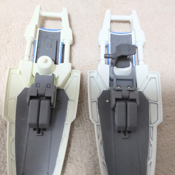 MG GP01-fb シールド改造左側が元のシールドでダボ1ヶ所で腕に取り付け、右側、ダボを切り飛ばして穴を開けてポリキャプを仕込みました。写真2枚目の接続パーツを取り付けて、シールドを取り付ける方向を変えれるようにしました。MG GP01作成される方は、何かしらの方法でされます。シールドの取り回しが変わります。（2枚目）