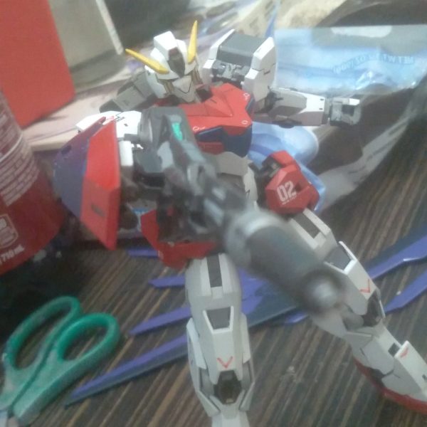Update on the XVX-02 Gundam Leander. Added the uraven rifle. Made a brace from plastic plate that connects the rifle and the arm. Added a hole so the shield can be mounted on the outside of the rifle. Lastly, I used some 30MM parts to make some booster units that attach to the wing shields. It gives me the impression of the wing zero with its thruster pods opened up, lol. I also used a couple of 30MM thrusters on the outside connector for the wing shields. （1枚目）