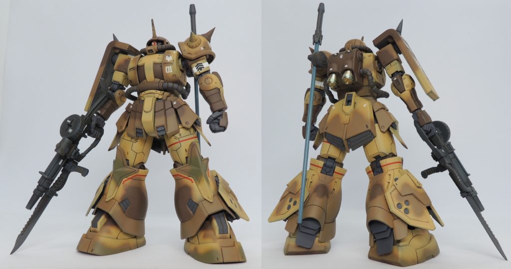 01 エグバ機です。迷彩塗装は、色の境目がフワッとなっているのが好みであるため、付属のデカールは使用せずにエアブラシにより表現しました(※以降全ての機体も同様)。ヒート・ダガーを装着可能な大型のザク・マシンガンや他機にはないヒート・剣を装備し、さらに指揮官機の証としての頭部ブレード・アンテナが特徴的で、キットを入手してから最初に完成させた機体です。