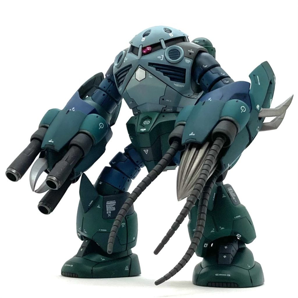 無謀にも…  単独でのジャブロー攻略を目指して開発された機体。ジオン軍の水陸両用型モビルスーツの中でも最もバランスが良いとされたMSM-07 ズゴックにEMS-05 アッグ、MSM-04N アッグガイ、MSM-04G ジュアッグ、MSM-08 ゾゴックの能力を詰め込んだ機体となっている。