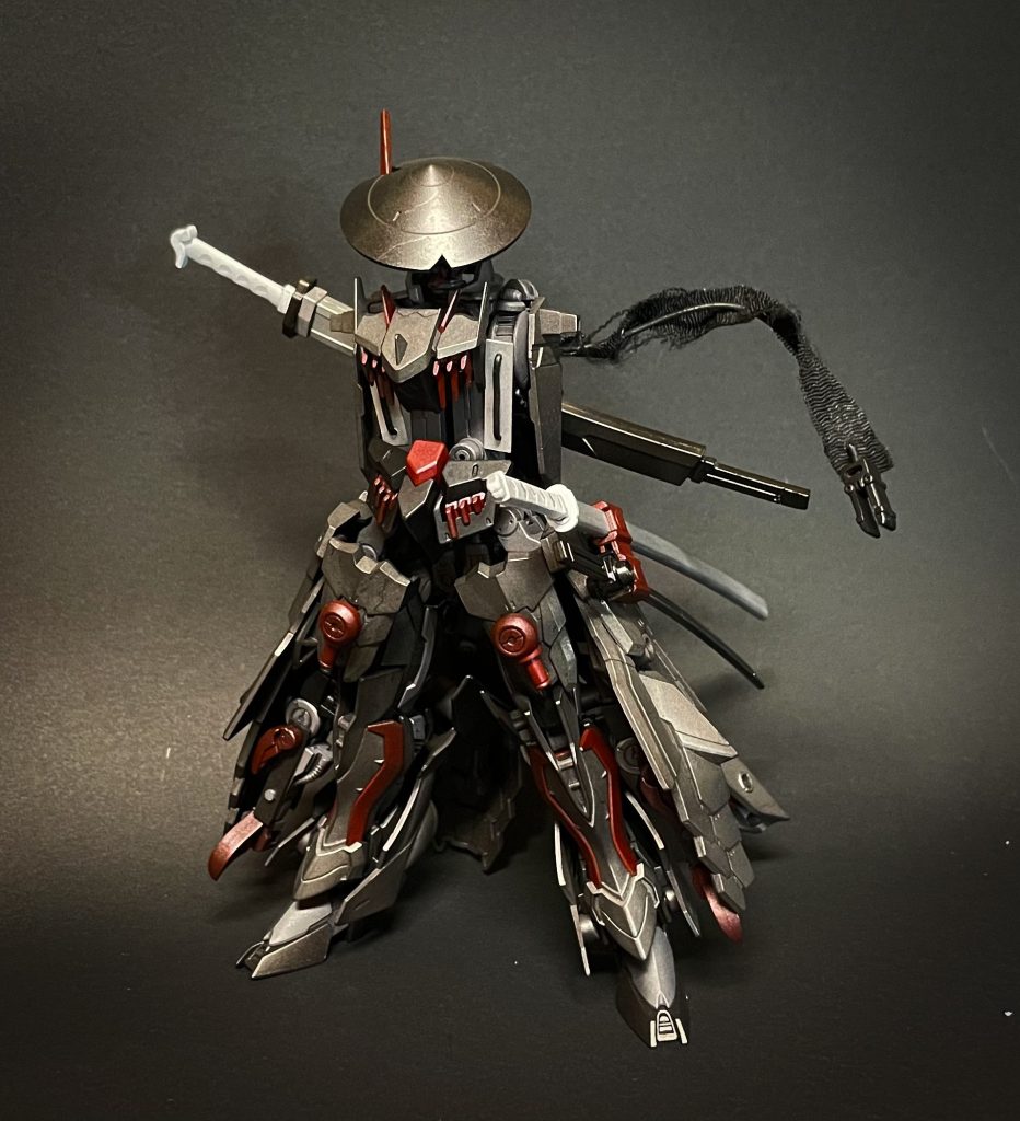 黒龍ノ髭頸から伸びる紐上の奇腕。腕が無い本機の為に奇襲用として取り付けられた仕込みの一つ。しなやかにうねる腕は鞭の様に刀を振う。