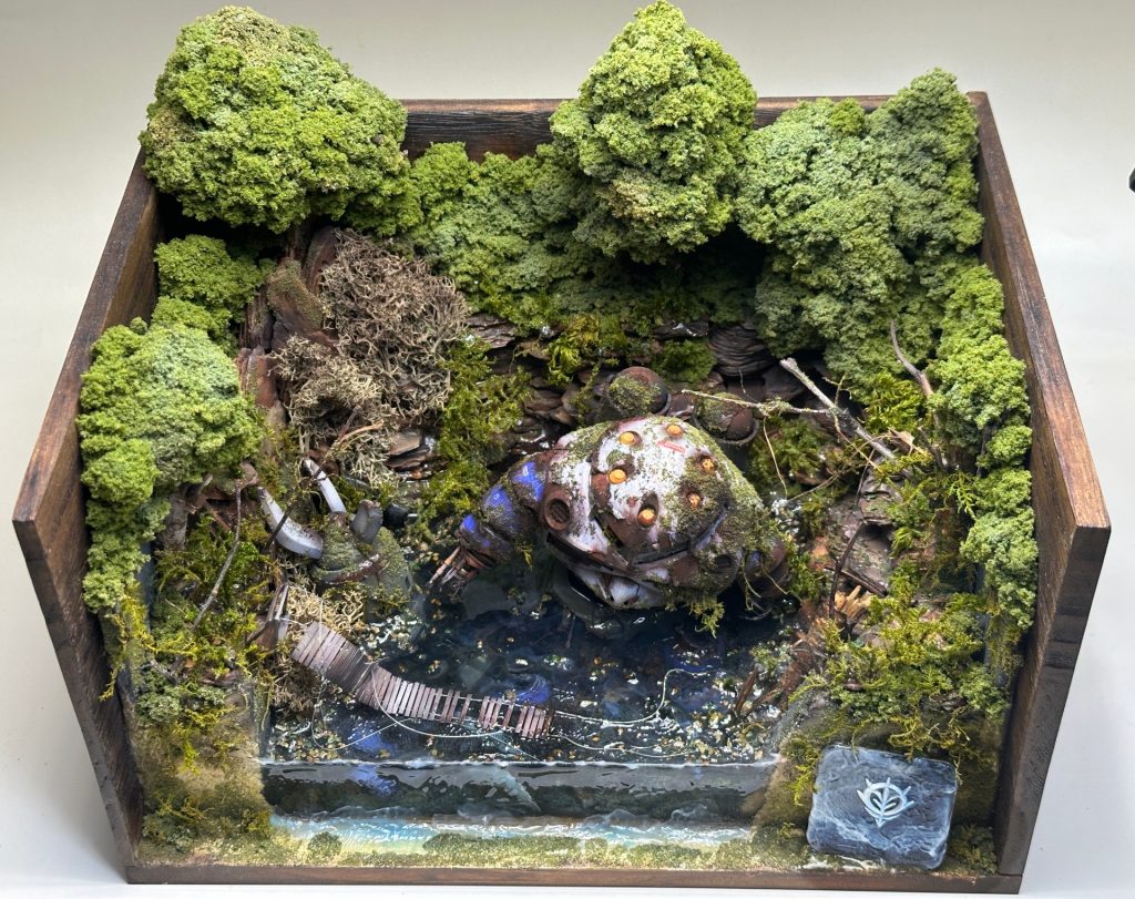 囲う感じで製作しています。サイズですが約ですが、縦20センチ横27センチ高さ16センチ程です。高さの最大値の木の部分の先端まで入れますと21センチとなります。