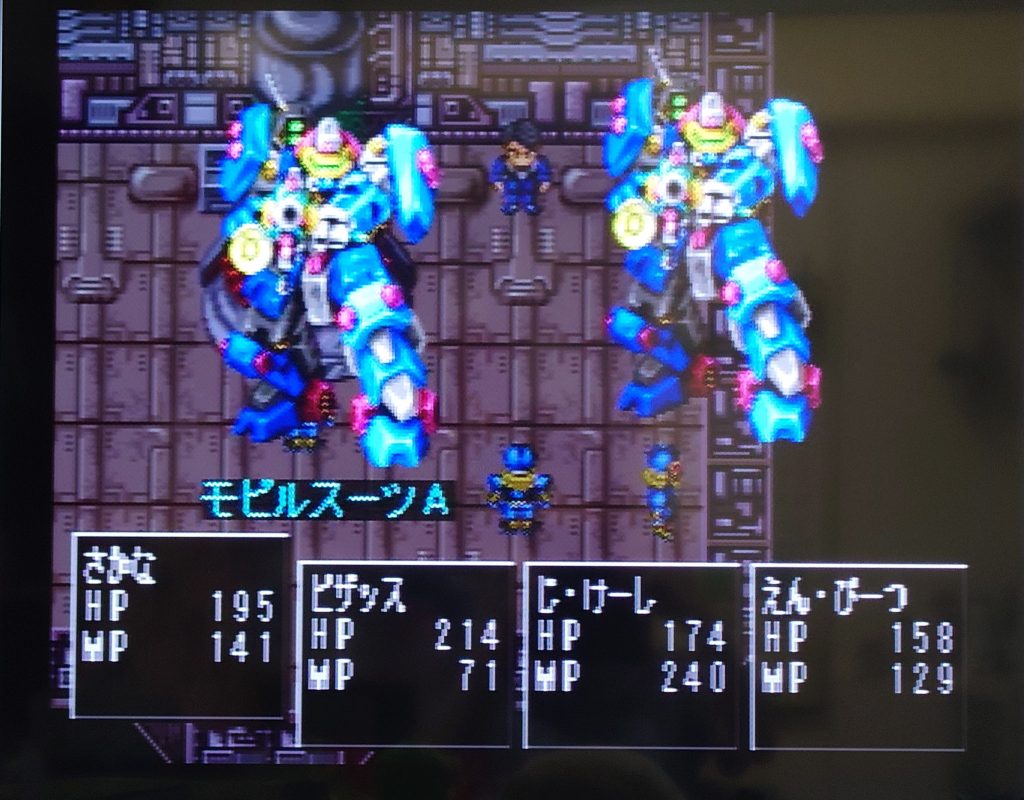 (写真は実際のゲーム画面を撮影したものです)そこには「モビルスーツ」の姿が!白い「ガンダム」(もちろん強い)もいるよ!・・・やるしかないな、過去の自分とのクロスオーバー!※pixiv冒頭の一連のシーンはゲーム内の展開を最後を除きそのまま再現したものでした・・・と言う訳で始まってしまったのがこれから始まる「GBNW完結編」だったのです。発表からここまで三ヶ月かかって色々と隠していたのはこのためだったのです。今日はボージョレの解禁日(と言うことを言い忘れた)。今回の「完結編」で、アルザスの物語、GBNW世界のGBNの物語は完結します。5年間の感謝を込めて、そして「Re:RISE」配信終了から3年、「NEXus」打ち切りから2年も経ったので、「今更ながらGBNの事忘れてるかもしれないな」とか「エルドラ事件のラストはGBNW時空独自なんだよな」などなどと「総集編」を込みで考え、突き詰めていった結果・・・いつもの「小説パート」では足りなくなり、pixivで展開の「小説」に。製作の方も執筆の方も丁寧にやった結果、作業は今までのGBNWと同等かそれ以上となり、既に期間中の積みは2桁、各方面に影響が出ていたりもしますが(「ポケモンSVゼロの秘宝」未だにやれてないんだ)・・・ともかく約3ヶ月かけて全作業が完成、お届けすることができます。「過去の自分とのクロスオーバー」という個人的お遊び要素も兼ねているのですが、連載としてはいつものGBNWです。スケジュールはこちらの予定、最後までお楽しみください。・・・元々本当は別の「GBNW」世界を下敷きにした企画を考えていたのだけどね。こちらについては次回・完結編第1改で。