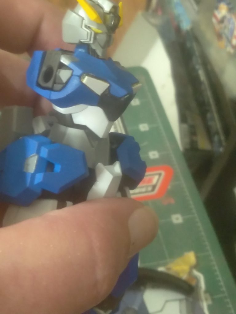 It might be hard to see, but I used thin strips of plastic to make venting details on the chest. Since in my mind, this Gundam has a pilot, the shell unit isn't needed