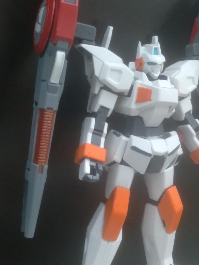 By drilling holes into the shoulder armor, It is able to mount different types of equipment