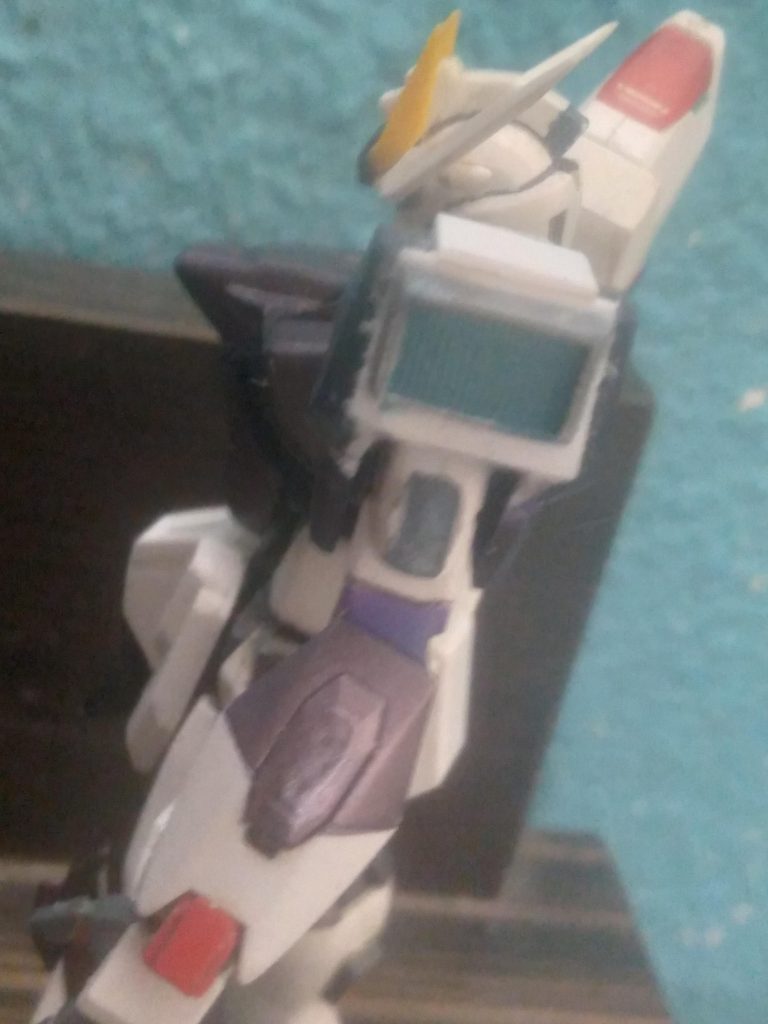 I trimmed the p.s.f shoulder armor, added some plastic plate pieces, and then a thruster