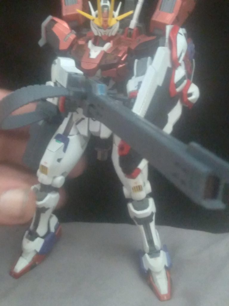 From the 30MM gatling set, this is the long rifle with attached energy tank. The flexible ammo belt is really cool. The holes on the sides of the legs helps out with mounting it