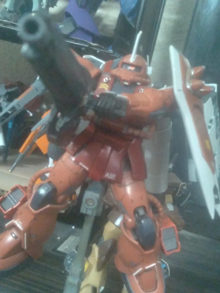 ZGMF-X1000 Zaku WarriorDeveloped by ZAFT to be their mass produced mobile suit, the Zaku Warrior is highly adaptable for many different types of situations. First, it is highly customizable. Many ACE pilots board custom machines. The lower legs feature hard points for attaching various equipment. The backpack area was redesigned. It features a quick release system that makes equipment changes fast and easy. As of this writing, there is only one known wizard pack developed for it. The Space Wizard Pack has additional boosters mounted for blinding speed. It also has propellant tanks that increase its sortie time.