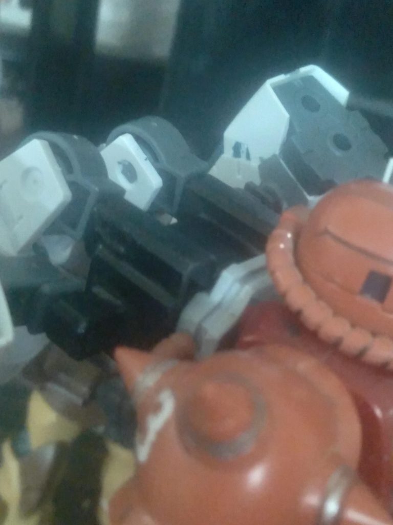 The backpack is from the powered arms option set. The boosters and tanks are from 30MM. The rifle is from the Tertium arms set. The shield is from the older HG zaku warrior. The backpack mount came from spare parts. The power pipes fit perfectly back in place as well.