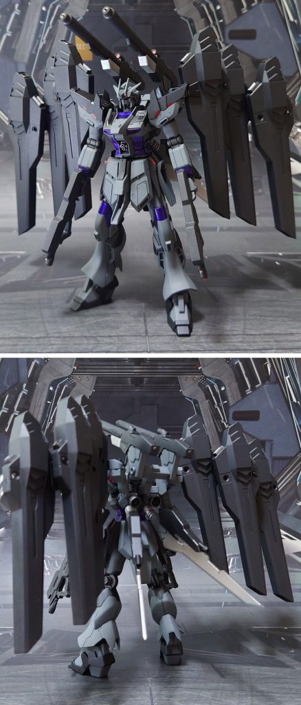 Hi-νガンダムティミドゥスの前後ろ。ゲート痕の再処理、各部エッジ尖らせ、肉抜き穴埋めとできる範囲での合わせ目消し、ヒケ対処、市販のプラ/金属パーツ貼り付けでディティールアップ工作。合わせて、腰と股関節、足首のボールジョイント軸、他一部接続軸に真鍮線を軸打ち。腹部コックピットハッチにはビルダーズパーツを貼り付け、“カリドゥス複相ビーム砲”を装備しました。ガンプラなのでコックピットは不要、または好きな位置に設定を変えれば良い、と考えています。