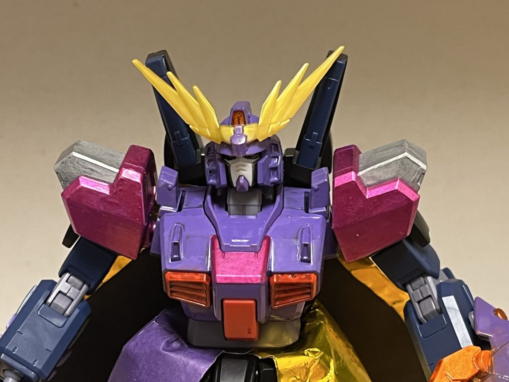 ゴッズレイホーン頭部に追加された専用アンテナ。「ガンダムへの攻撃」のみを数十倍以上に増幅させる特殊能力を有している。ガンダム相手であれば、ビーム・実体兵器を問わずにも強化されるので、単なる小型の機関砲1発ですらPS装甲を持つガンダムをも撃破可能とする。ガンダムが搭載しているだけで適用される為、戦艦をも一撃で撃沈させるだけでなく、その気になれば巨大な基地や宇宙要塞もビームライフルの一撃だけで破壊できるほど。対ガンダム戦限定ではあるが、武器を使わずとも凄まじいパワーを発揮し、パンチやキックだけでもPS装甲持ちのガンダムを撃破可能なだけでなく、大ダメージを与えられるだけでなく、巨体を誇るデストロイガンダムさえも持ち上げられるほど。このゴッズレイホーン自体の強度の高さもあって、頭突きや角を使った刺突も強烈で、対ガンダム戦では直撃すれば一撃で貫通し、ガンダム以外でもPS装甲や戦艦にさえ大ダメージを与えられるほど。