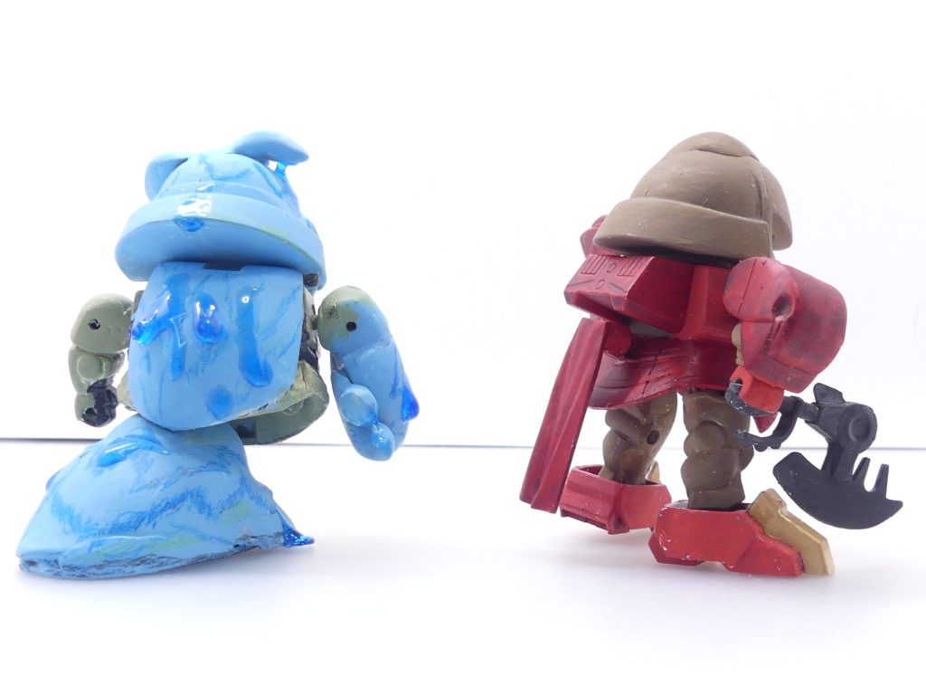 モンスーツの生成:モンスーツ・ガンダムはGBN内のデータに強制ハッキング、空間内に自分の手下たる「モンスーツ」を生み出すことができる。モンスーツはGBN内で「勝つ」ために設定されており、ほとんどのガンプラの攻撃は通じない。キルゴアの勇者パーティーはこれを倒すことができるほか、のちに一部条件で撃破が可能となる。後ろから。ゴブリン腰帯は「ぷちりっつ ギルガメッシュ」から。斧はBB戦士ザッパーザクから。