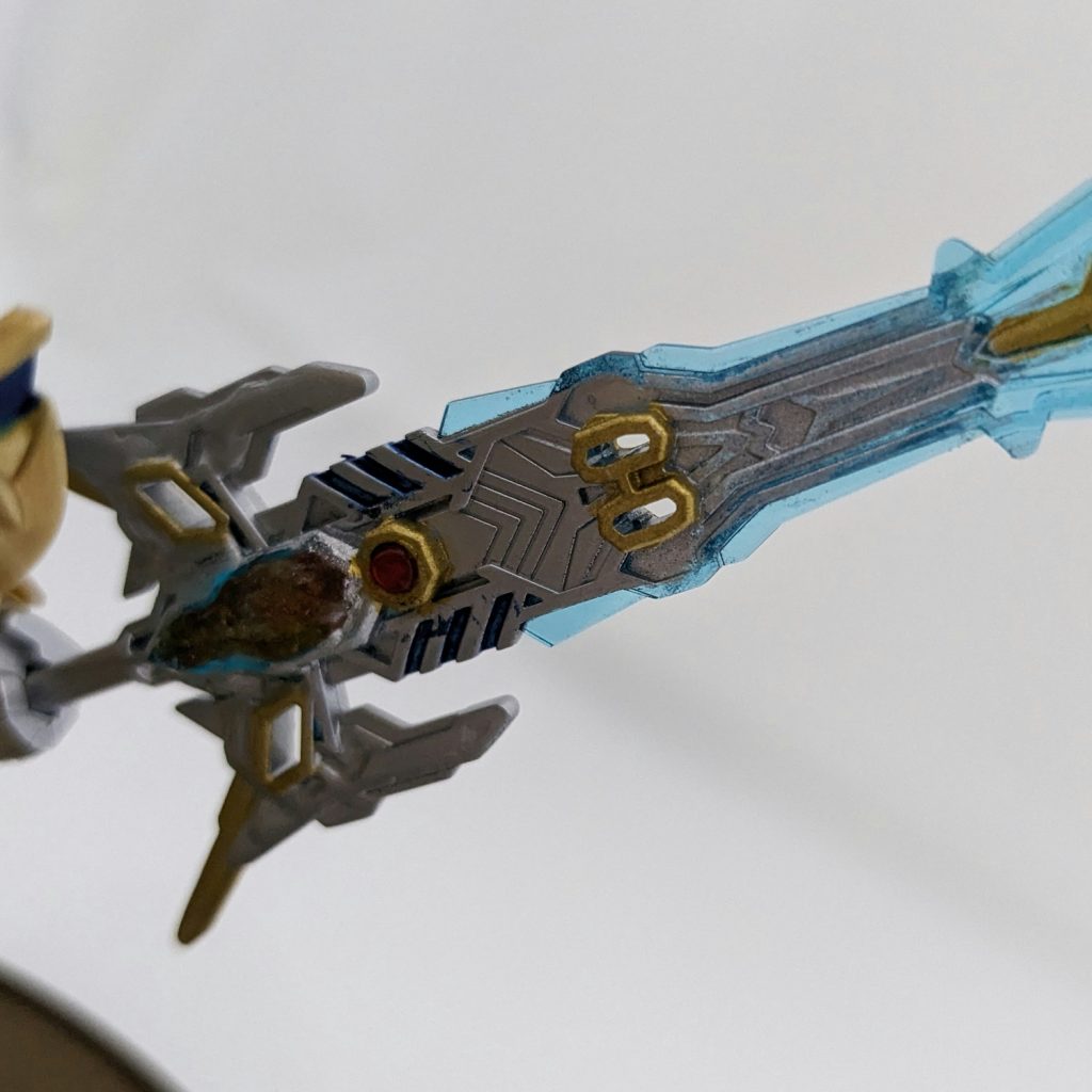 エクスカリバー裏面の肉抜きを接着剤で埋めようとして盛りすぎた結果ガタガタに