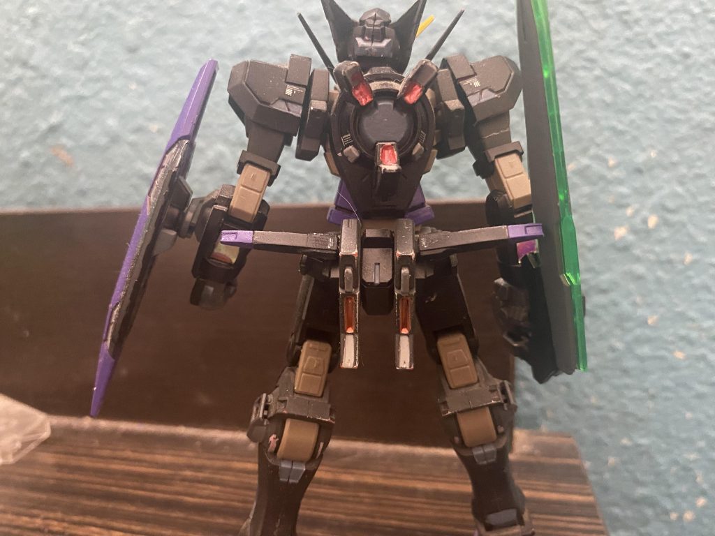 Rear shot. Metallic red was used on the chest and back parts as well as the head sensor. I lasi equipped the amazing gn sword from the hgbf amazing exia