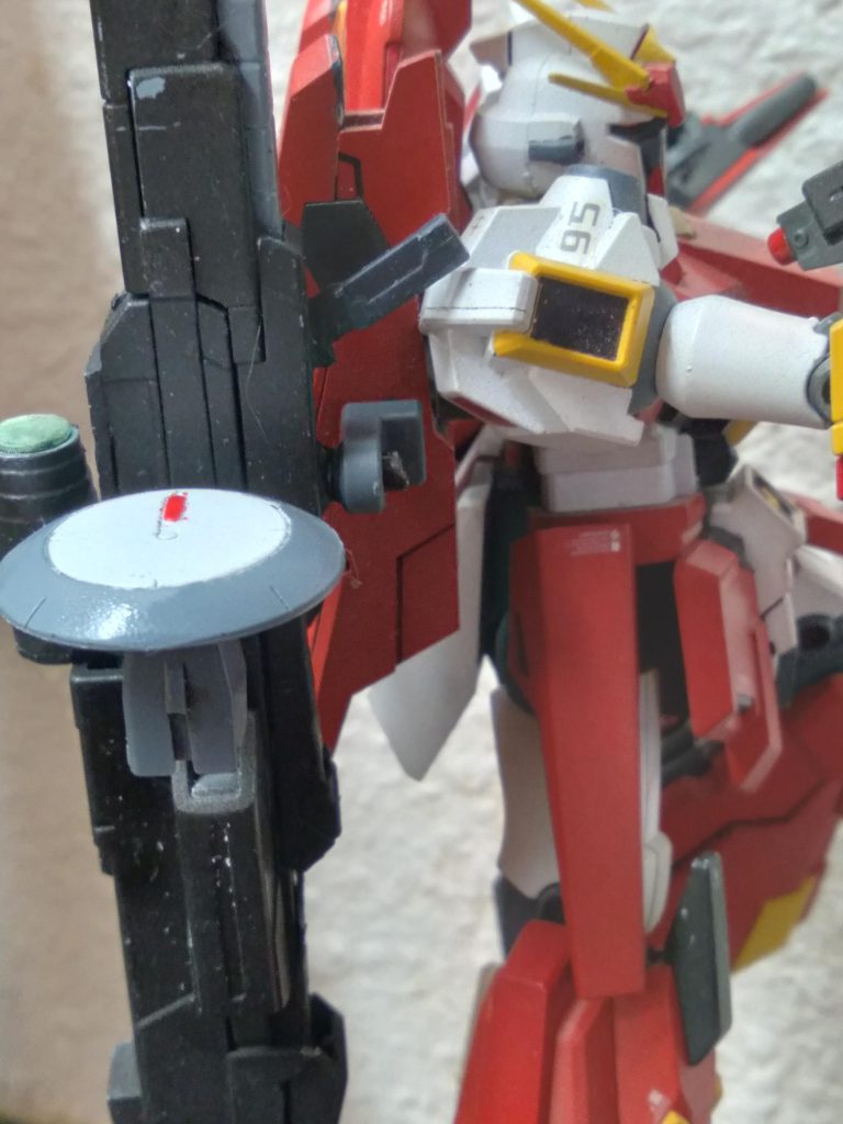 Based off the RGZ series of mobile suits, this particular unit has had improvements made to greatly enhance its performance. The frame has been strengthened as well as the output of the reactor has been increased. It is meant to be a partner machine to the AVX-001 Aevus Gundam.