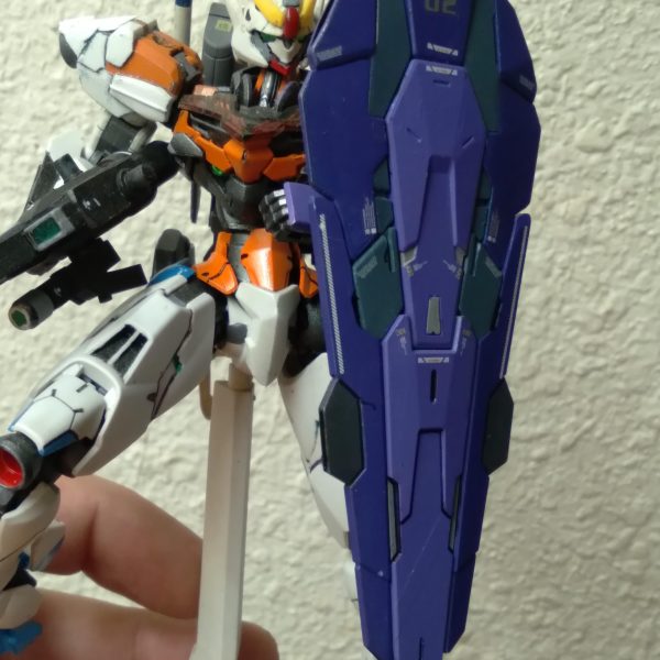 Update post on my custom Gundam Lfrith. It's changed a bit since my previous post for it. I repainted it. After I did that, I had the idea of making some shoulder thrusters for it, so I did. I used plastic plate to make the transition look as smooth as possible. I feel like I did a good job. I used some plastic strips to add some details to the shoulders. My air compressor stopped working on me so I'm currently without an airbrush, which isn't fun at all. I had just gotten some semi-gloss topcoat from gaianotes the day after it broke down on me. So I haven't been able to try it out. I hate not being able to paint, lol. If anyone would like to help me get a new one, I am accepting donations, haha. I hope you like my progress post. Have a good day（2枚目）