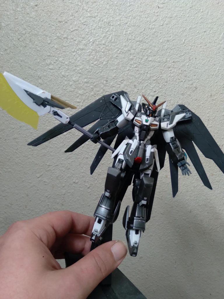 If you remove the blue parts on the arms, there is a 3mm hole beneath them. This is for attaching one of my beam shield effects. It works great for defense.