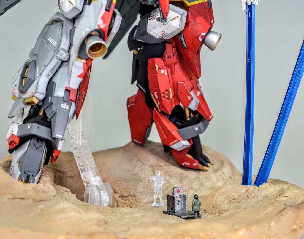 愛機とともに鉄華団の慰霊碑を訪れたパイロットの元にオルガ団長が現れました。