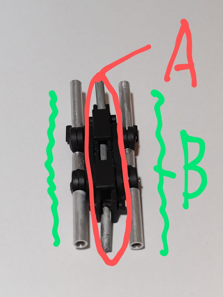 その後いろいろ試作してやっと完成品。A パーツ固定、接続ジョイント。ランナー、プラ板で作成伸縮、屈折します。B 姿勢保持ジョイント。ホビーベースさんの関節技、アルミパイプで作成。