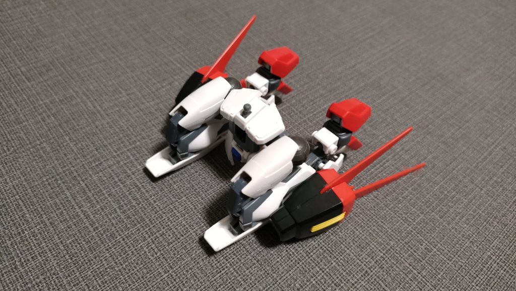 股関節を開いて正座をさせ、ブースターの位置を調節