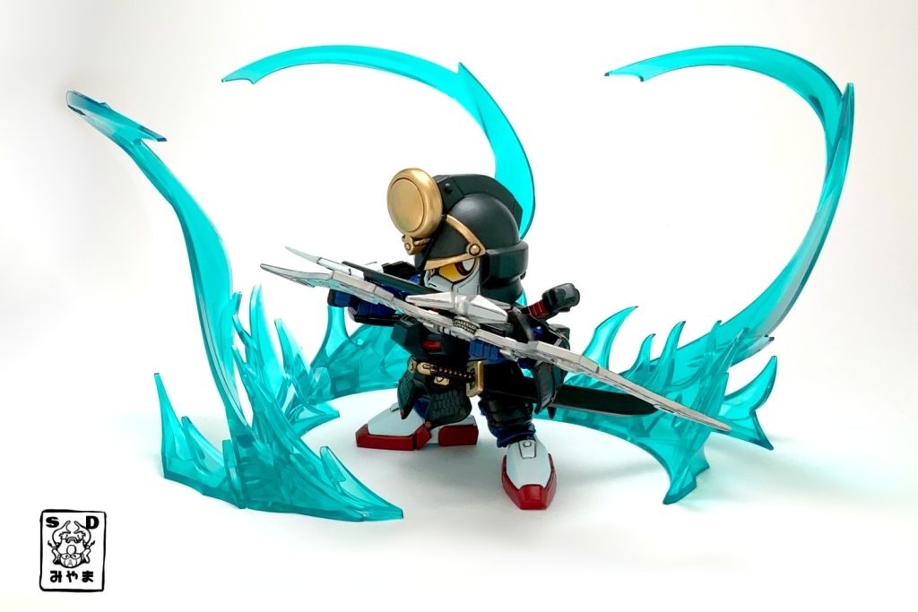 放った一撃が闇軍団本陣を貫き、その戦は頑駄無軍団が勝利を得る。この功績により、真悪参は武者の称号を得た。