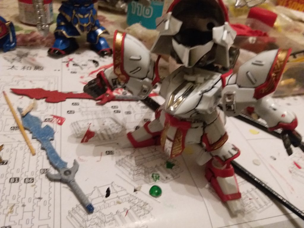 用強力膠整眼再貼在貼紙上