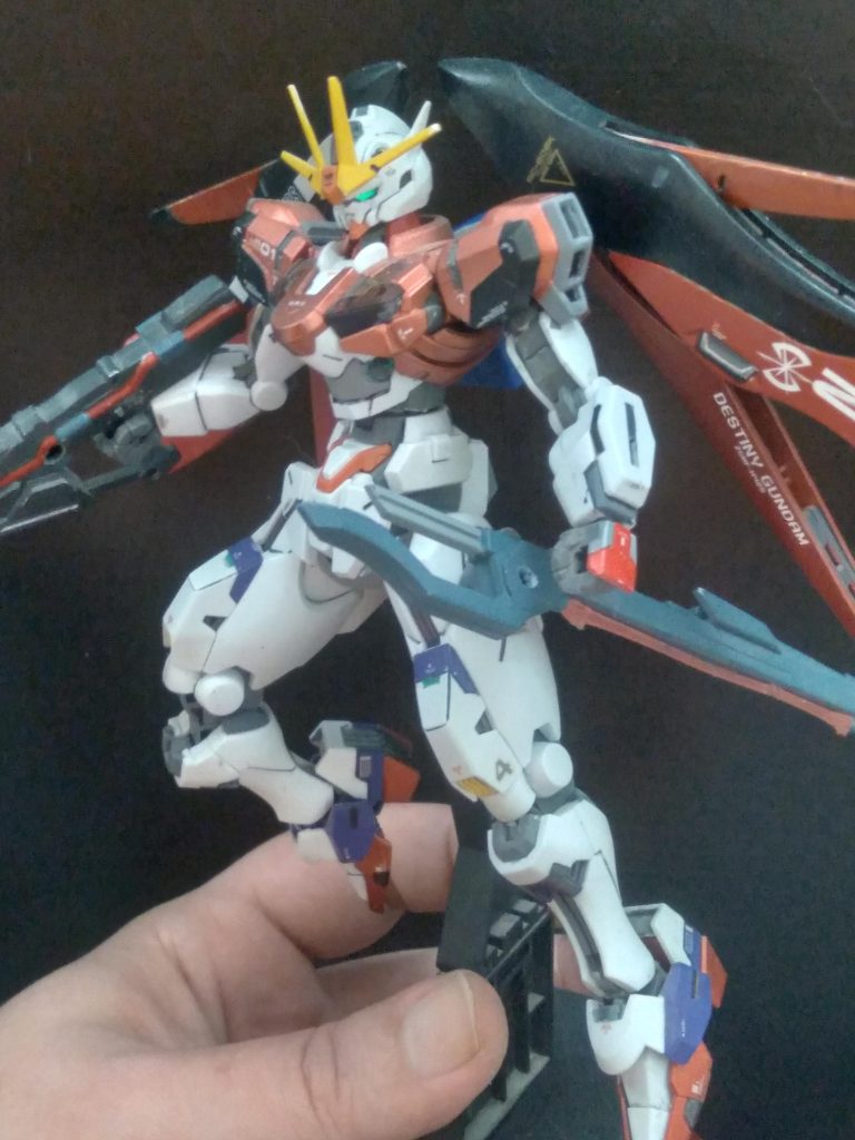 It has the perfect strike freedom anti-ship sword along with the rifle from the delta kai 