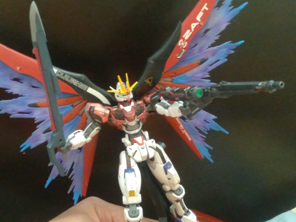 Wings of light deployed. I painted the effects myself. I used white, sky blue, purple, and clear purple. I tried for a glowing look but I don't think I was able to do a good job