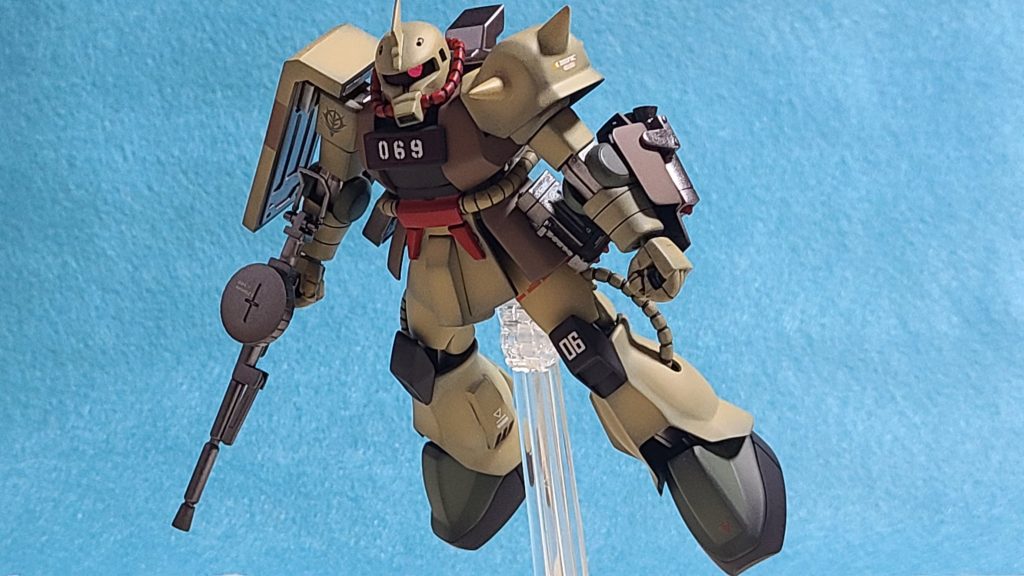 ザクデザートタイプとは、すでに重力下仕様として配備されていた06J型により積極的に地上用に適した改修を施した局地戦用MSである。既に局地戦用MSとしてはtype07計画が進行していたが、06系の供給を望むアフリカ戦線などの要望もあり開発が開始された。機体の特徴としては、より積極的に大気冷却を取り入れると同時に各部に補助推進器を追加。14％もの機体軽量化を施すと共に専用の武装を装備する機体となっている。