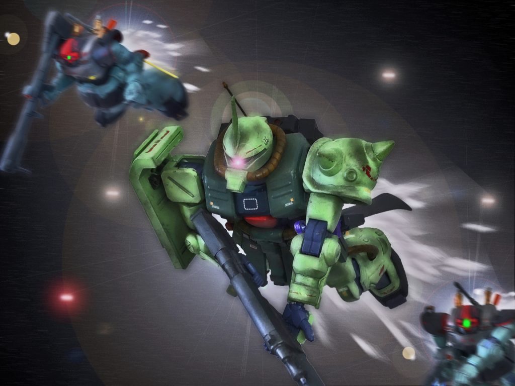 「地球でも作戦が開始されている頃だ。我々はルナツー港湾施設の破壊が第一目標だ。いずれ宇宙が主戦場になる。艦の居ぬ間に還る場所を潰せば、宇宙で軍備を整えるのにも時間がかかる」「ええ、同胞には悪いですが地球はもう‥」「気にするな。それよりここで足止めされては『本来の作戦』に支障をきたす。港湾破壊用バズーカ装備のブラボー、チャーリーは最大速でここを突破し先に行け。護衛のアルファは周囲を警戒しつつブラボー、チャーリーをアシスト」「大尉は？」「先ずはアイツをやる!各機散開！」各小隊は各々で纏まるとスラスターを全開にし先程より長い光の尾を引く。新型のリック・ドムは従来のザクよりも速い機動を見せる。