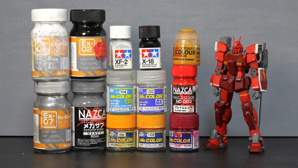 ↓塗装レシピ↓下地:メカサフヘビィ赤:NAZCAフレイムレッド濃い赤:フレイムレッド+ワインレッド+黒少量黄色:黄褐色+キャラクターイエロー黄色(バーニアなど):シタデル ベースイエロー(筆塗り)白:ガイアEXホワイト+黒少量シルバー:ガイアEXシルバーグレー(明):黒と白混ぜて調色グレー(暗):メカサフヘビィそのままグレー(バーニア、一部装甲裏等):タミヤエナメルの白と黒混ぜて調色(筆塗り)クリアコート:GXスーパースムースクリアーつや消し+光沢少量