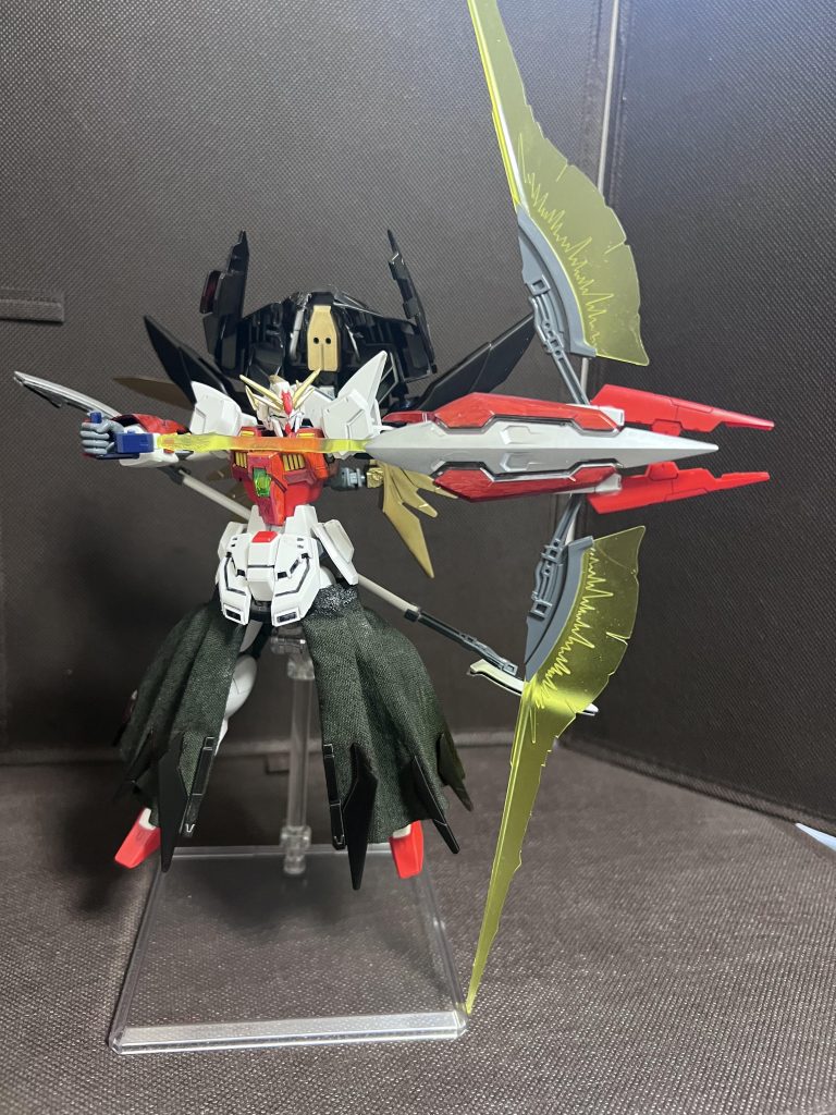 弓を引くポーズ