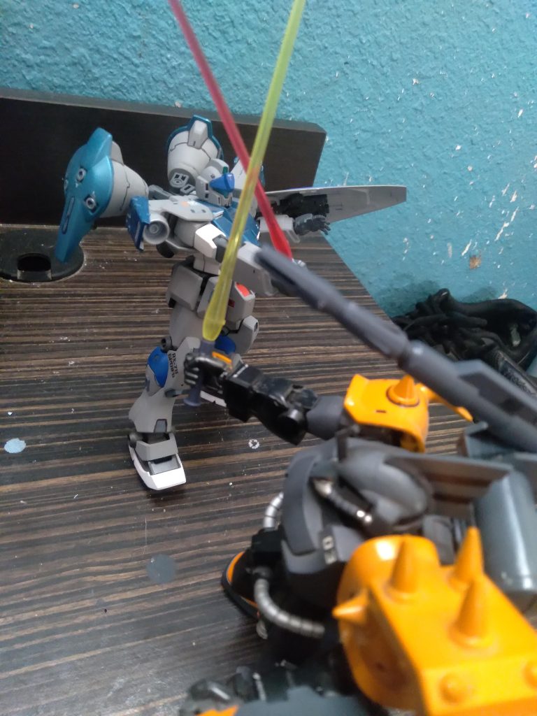 Locked in battle with the GM Full Burnern. Both mobile suits are prototypes. The GM is the testbed for the GP01fb boosters and the Gouf B-Type is furthering Zeon's knowledge of beam weaponry