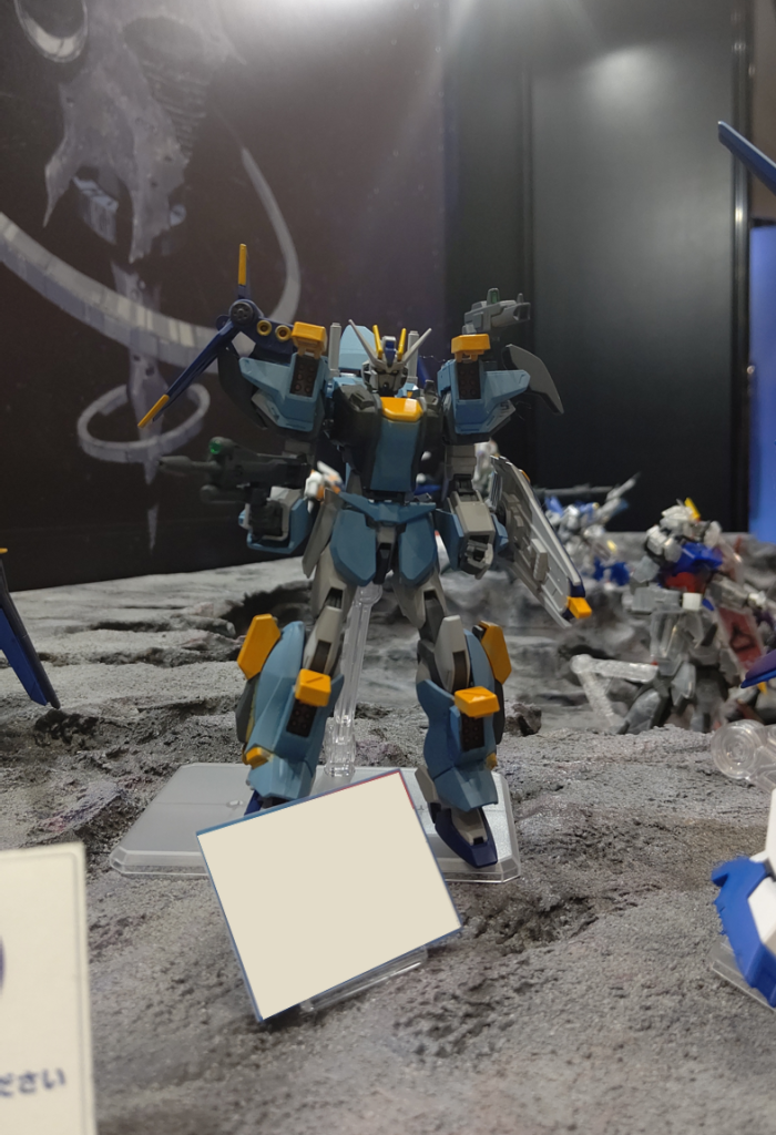 2/14~ガンダムベース東京にて作品を展示しています。バレンタインなのかお土産のチョコクランチ持ってる人がちらほらいましたね。周りの作品たちが素晴らしすぎて霞んでしまいそうです。ガンダムSEED、バレンタインデー、ユニウスセブン、うっ、頭が、、