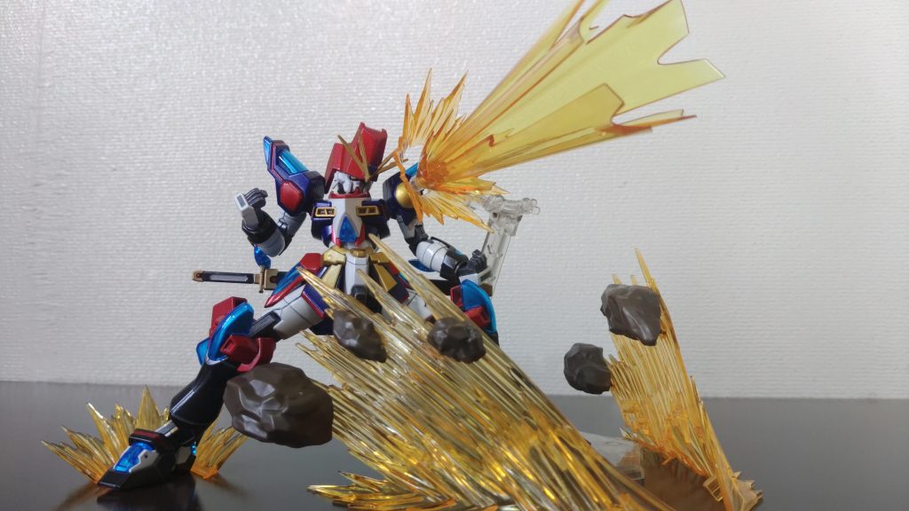 オジー自慢の「オリオンビ～ム」ネオリュウキュウの老舗ビールメーカーが開発したビーム兵器さ～。搭乗者のアチコーコーのハートとティーダの力が合わさったときに打てるビームで、直撃したガンダムは搭乗者がビールを尋常じゃない程飲みたい衝動に駆られ、ガンダムファイトどころじゃなくなる恐ろしいビームさ～。ちなみに観戦していた人間にも同様の効果がありその日のビールの売り上げが爆発的に伸びるさ～。