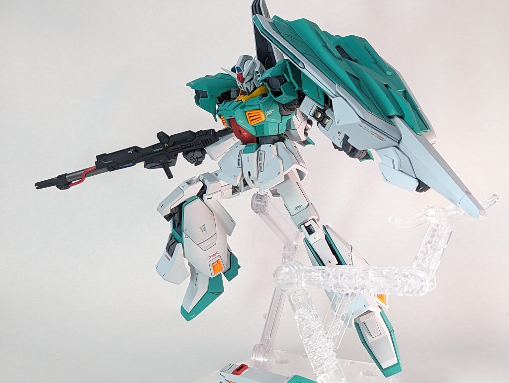 ガンダムMk-N(ine)マーク2のムーバブルフレームをベースに、Z計画で開発中の各種ユニットを装備した運動性能試験用の機体。可変機構は当初は想定外だったが、大気圏突入の高熱にも耐えうるZのバインダーの強度・耐熱性を惜しみ大型シールドおよびフライングアーマーとして運用可能なフライング・シールド・バインダーを装備する簡易可変機構を採用するに至った。後のリガズィのBWSにも近しい設計思想を見て取ることができる。グリプス戦役の混乱の中試行された数多のプロジェクトの一つであり、今となっては詳細を知る者はいない。N(ine)の呼称は開発者による、Z計画からの転用を意味するアルファベットの言葉遊びであり正式なナンバリングではなく、また正式な開発コードNoを知る者も今はいない。という脳内設定