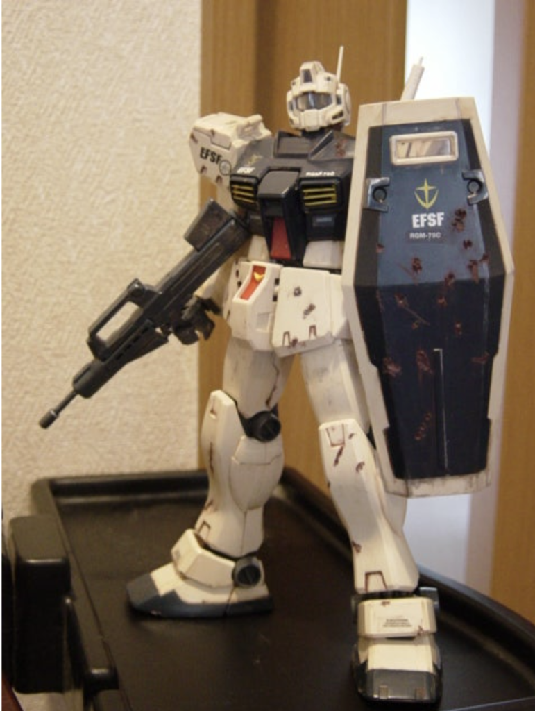 2005年頃、しばらく活動を止めていたガンプラ作りを復活した1作目がこのMGジム改でした。キットは当時誰かからのいただき物でどうせ作るなら当時ハマっていたデジラマ作りの素材として汚したりダメ痕着けたりしてみました(^_^;)何にもしないでも昔のガンプラに比べたら良く出来ていて良く動く事に感動したものでした(^o^)