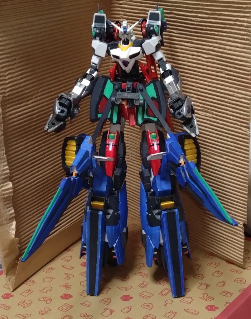 最初は『ネクサス』と『イクシード』の要素がまとまった形態。『イクシードネクサス』ネクサスに更なる加速を求めた姿とも言える姿。驚異的なスピードで、敵をサーベルで斬り裂くことができるようになった。また、イクシードの膝部分に装備するGNソードライフルのクローで敵を挟めて斬り裂くことも可能に。 この形態時の主な武装。バルカン砲パルマフィオキーナビーム砲×2ビームサーベル×2GNソードライフル×2また、『レギルスシールド』を追加装備すると『レギルスビット』の使用が可能に。