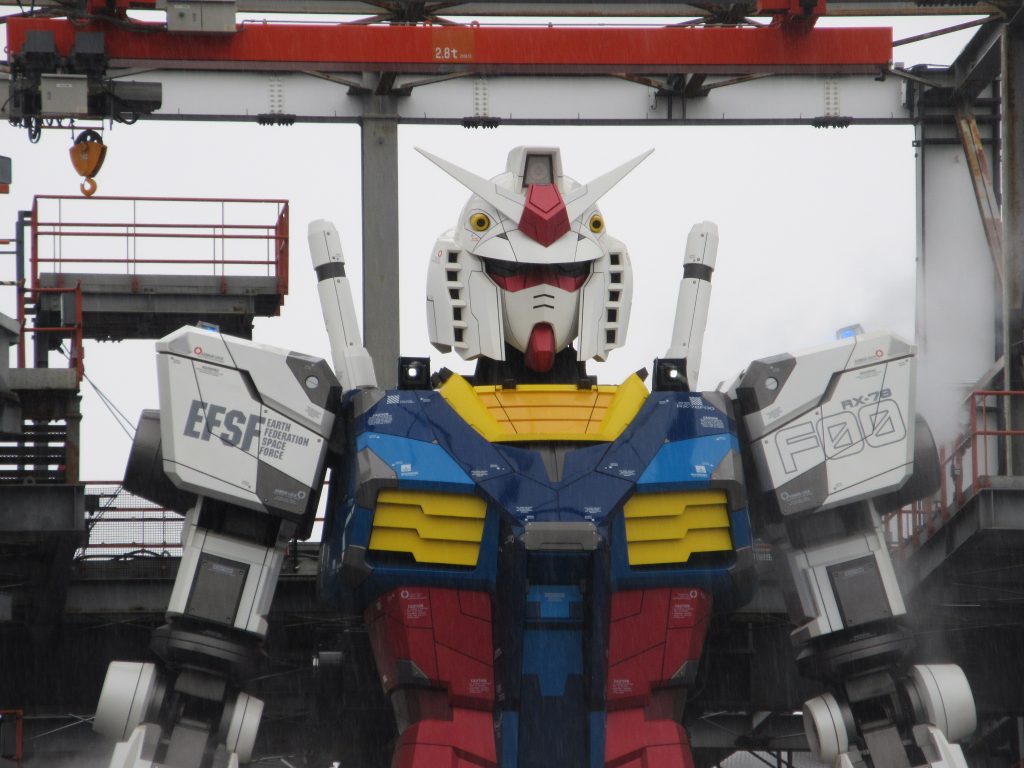 ありがとう横浜動くガンダム。筆者です。今回は「放課後」世界の解説編。「GBNW」だと武装テストの時に説明していれば良かったけれど・・・このような「解説」展開を挟まないと進められなくて・・・異世界・「エバーランド」。page0を参照の通り、SDガンダムが暮らす平和?な世界です。かつて、199X年にアマミチの父・マサミチ達7人のSDガンダム使いはここに召喚され、「エバーランド」に平和を取り戻した……はず、だったのですが。