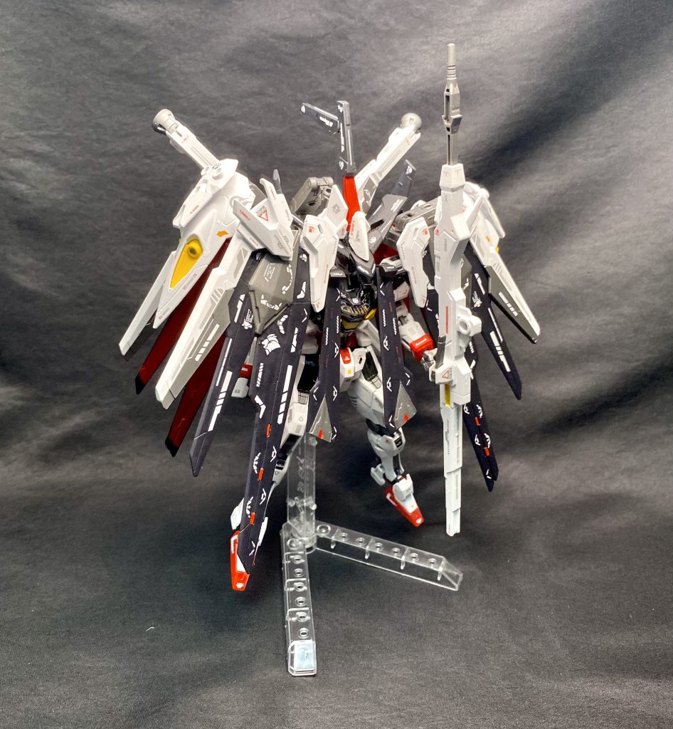 追加ユニット「魔女の帽子」対オーバーライド用のフィールドを形成するユニットであり、パイロットの負荷を少しでも軽くする為に製作された後付けユニットまさしく魔女の姿である