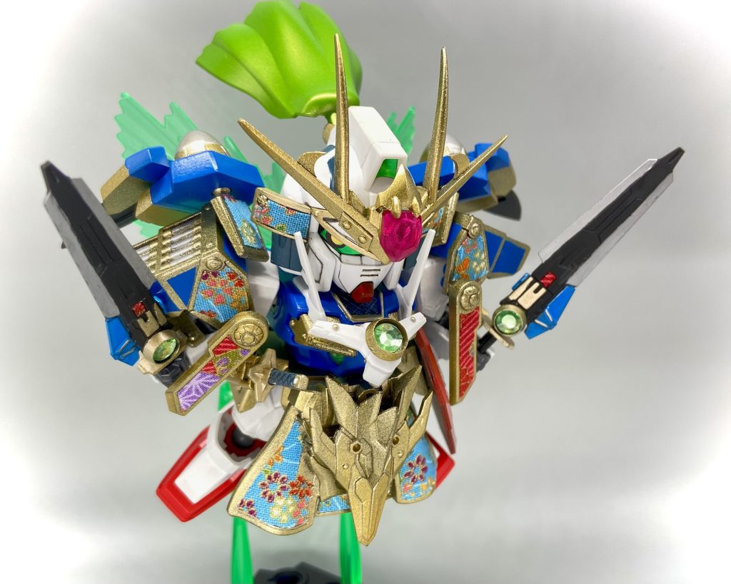 塗装はちょっと絢爛豪華なギラついたゴールドにしたかったので粒子粗めを採用！白と赤は基本的にうっすらパールクリヤーで質感上げただけの成型色活かしです。鮮やかで派手にしたかったので妙なことはせず、ブルーはブルーの原色ままで塗ってます！以上　72代目武者頑駄無でした！久しぶりのガンプラand武者製作でしたがめちゃくちゃ楽しく作れました！Xではキャラ設定などを中心に公開してます！https://x.com/fxpr1huqlhukfyh/status/1763518470799643033?s=46&t=35gSoj972BgaL58hvqdLbQ企画そのものもすごい作品目白押しなのでぜひご覧下さい！