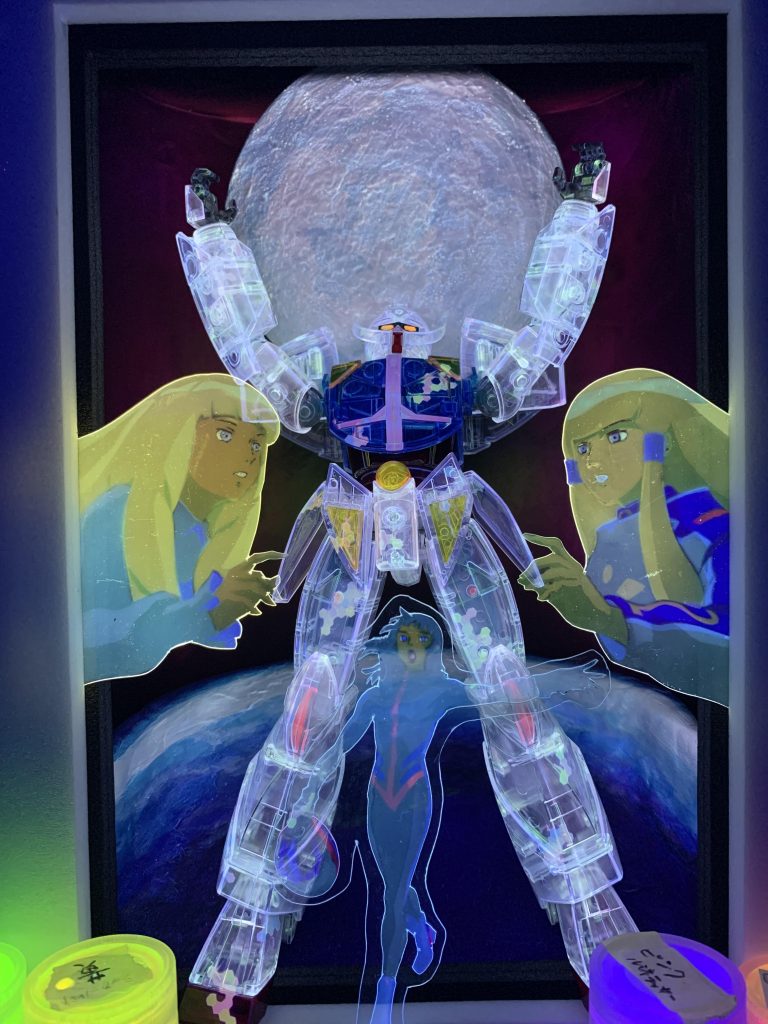 ボツ案基本、箱は捨てる派ですがこれは限定キットなので箱自体を作品の一部として使い、箱絵再現をしようとしていましたが気に入らなかったのでボツ!箱の内側にキットを立たせて額みたいな枠を付ける案でした。本体以外全部捨てました。