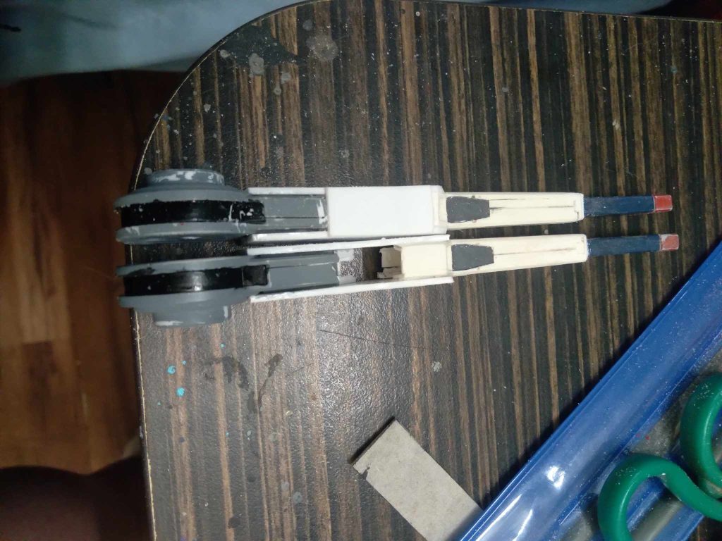 The rear parts are from the Age2 Artemis set. I added them as well as a 3mm hole for mounting