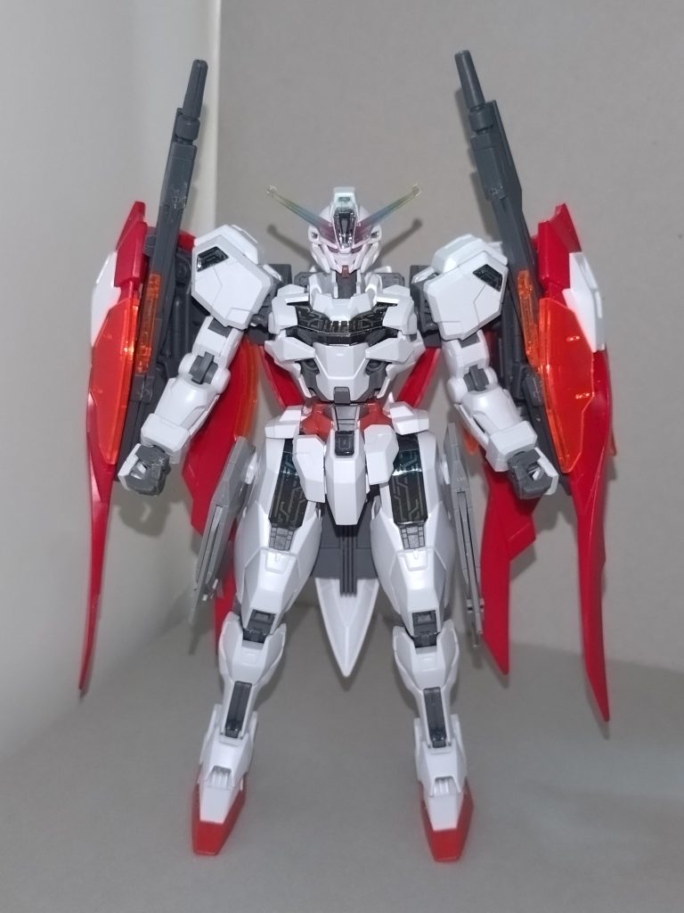 【概要】XVX-017W0 /アークキャリバーン 戸山香澄の後輩にあたる、三角初華が制作した改造ガンプラ。本人によると、設定は以下の通り。ガンダムキャリバーンをコピーし、さらにウイングゼロ炎のシールドとバックパックを追加することで、可変機に仕立て上げた、オックスアース社のMS。腰部ブースターの有無に応じ、MS・MA形態共に長距離狙撃用「ロス・ドロリス」と、高速度攻撃用「スープラ・ロス・ドロリス」の2通りに運用方法を切り替えられる。シェルユニットはあるが、GUNDフォーマットを持たないためGUND-ARMではない。